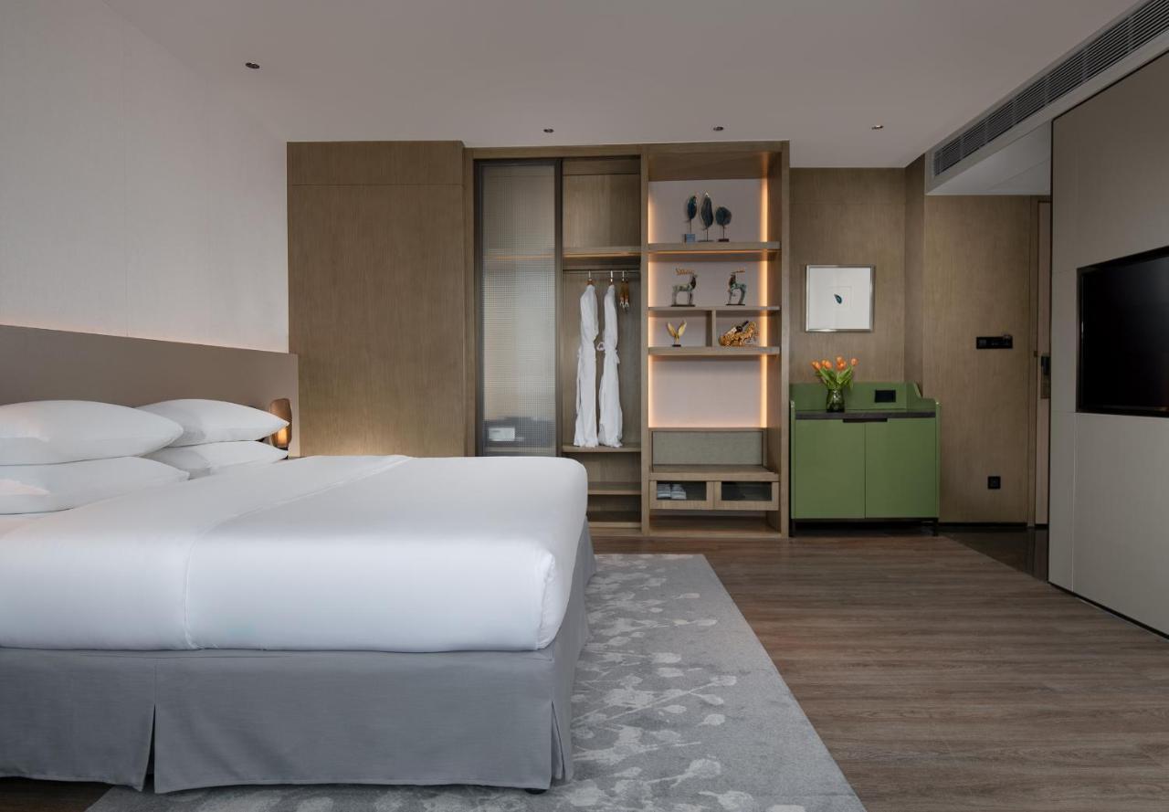 Golden Shining New Century Grand Hotel بيهاي المظهر الخارجي الصورة