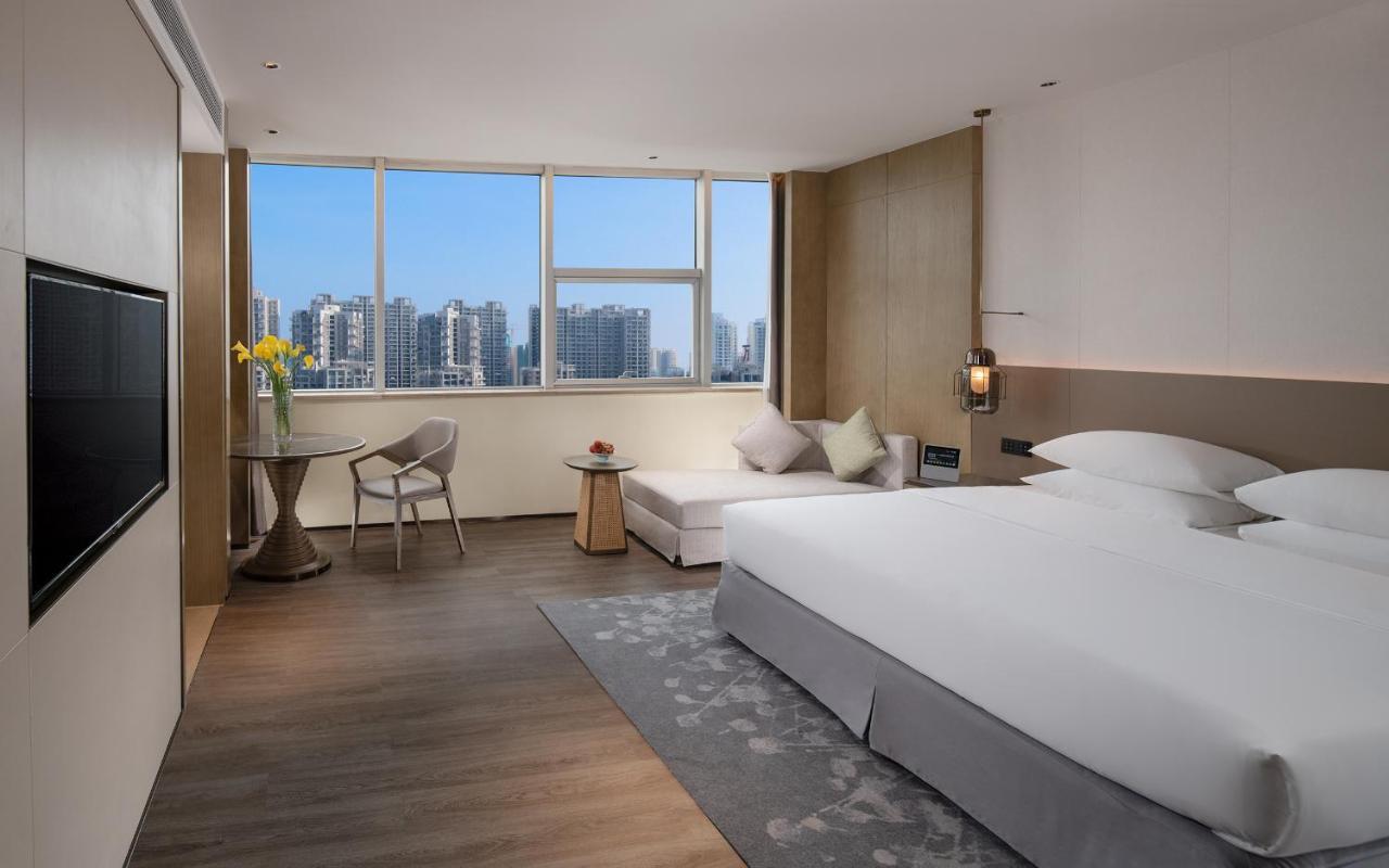 Golden Shining New Century Grand Hotel بيهاي المظهر الخارجي الصورة