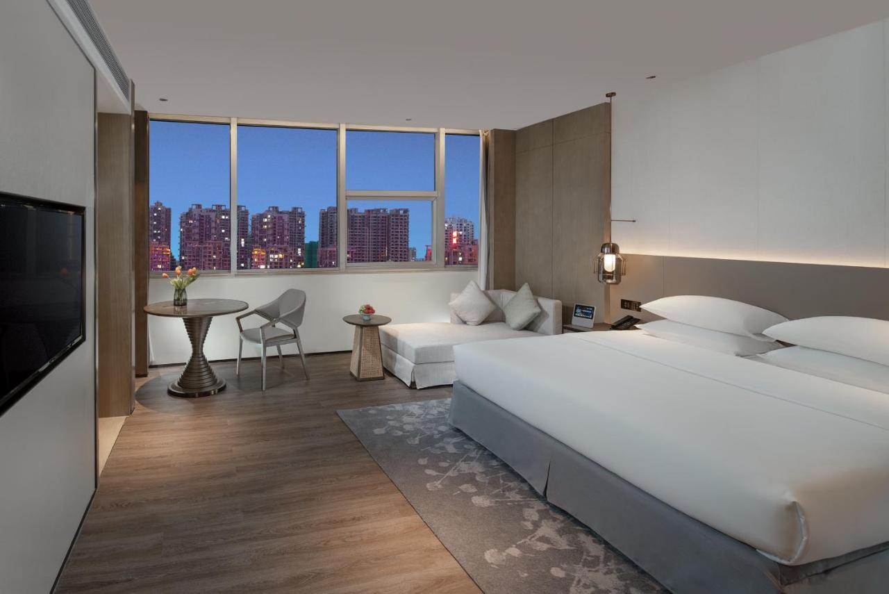 Golden Shining New Century Grand Hotel بيهاي المظهر الخارجي الصورة