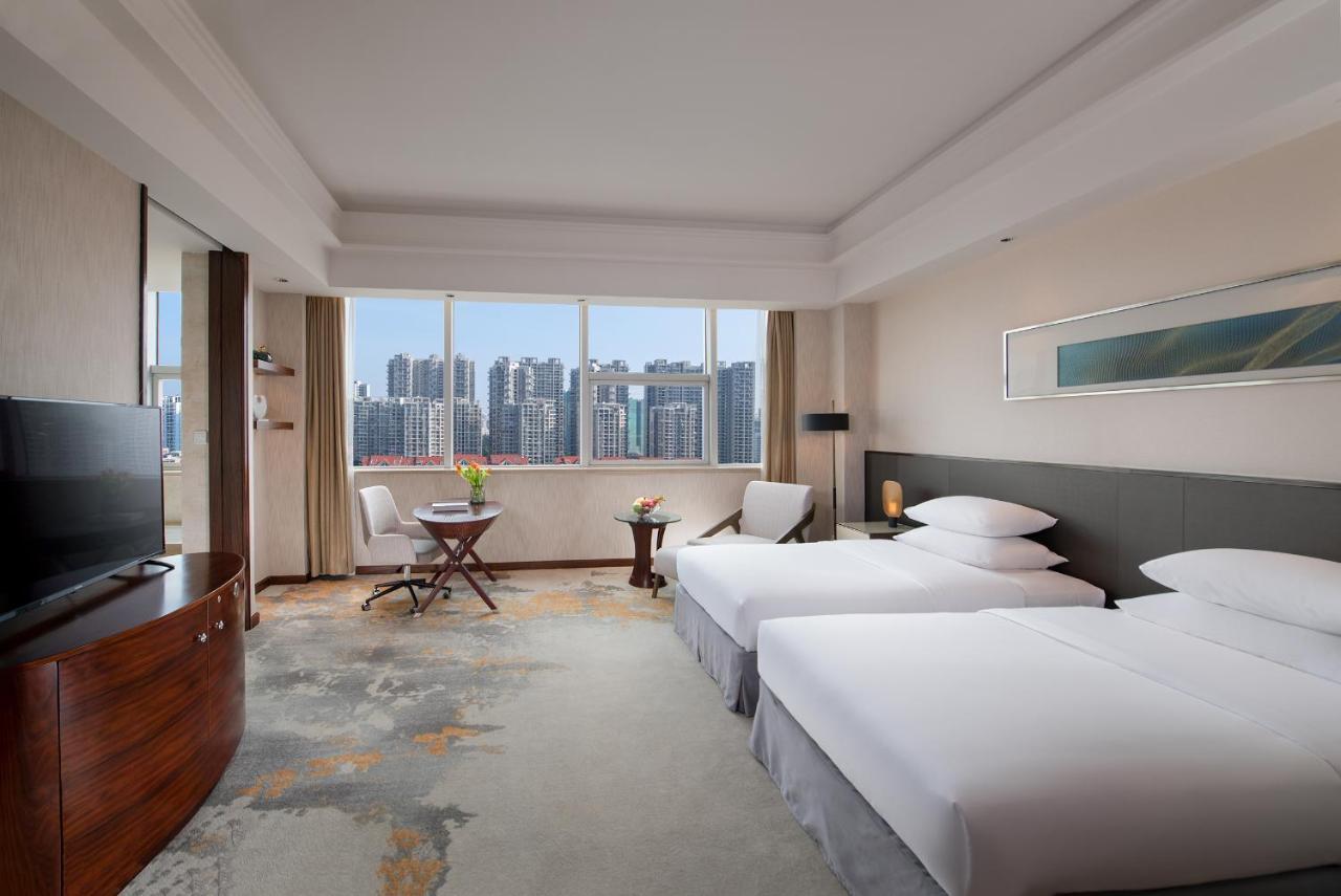 Golden Shining New Century Grand Hotel بيهاي المظهر الخارجي الصورة