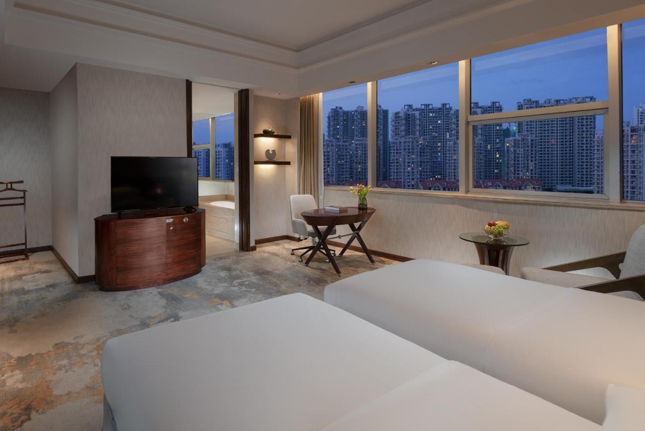 Golden Shining New Century Grand Hotel بيهاي المظهر الخارجي الصورة