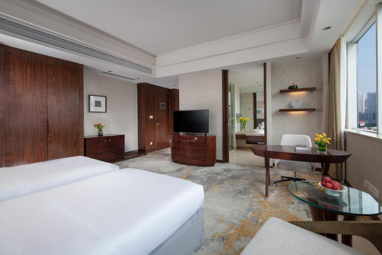 Golden Shining New Century Grand Hotel بيهاي المظهر الخارجي الصورة