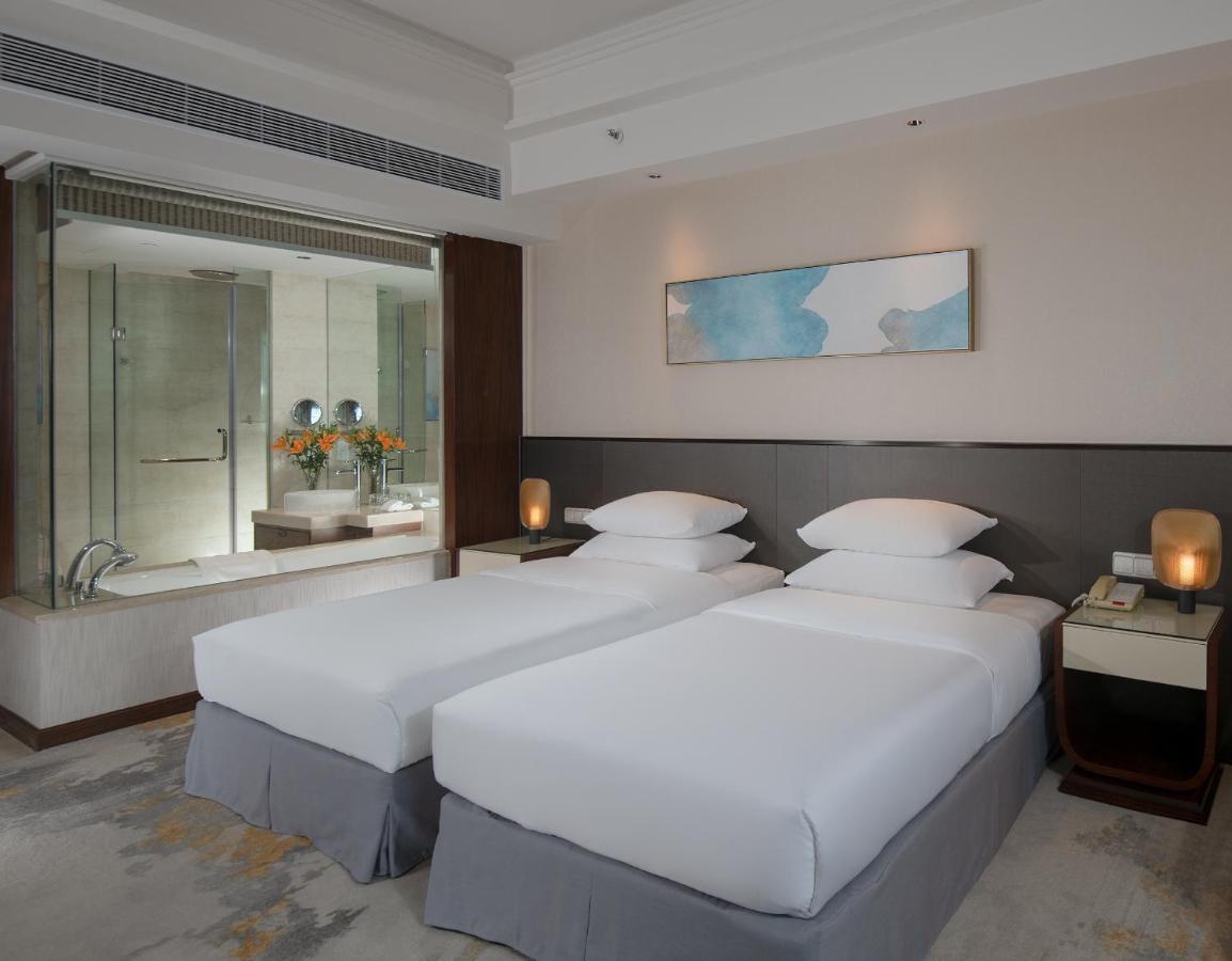 Golden Shining New Century Grand Hotel بيهاي المظهر الخارجي الصورة