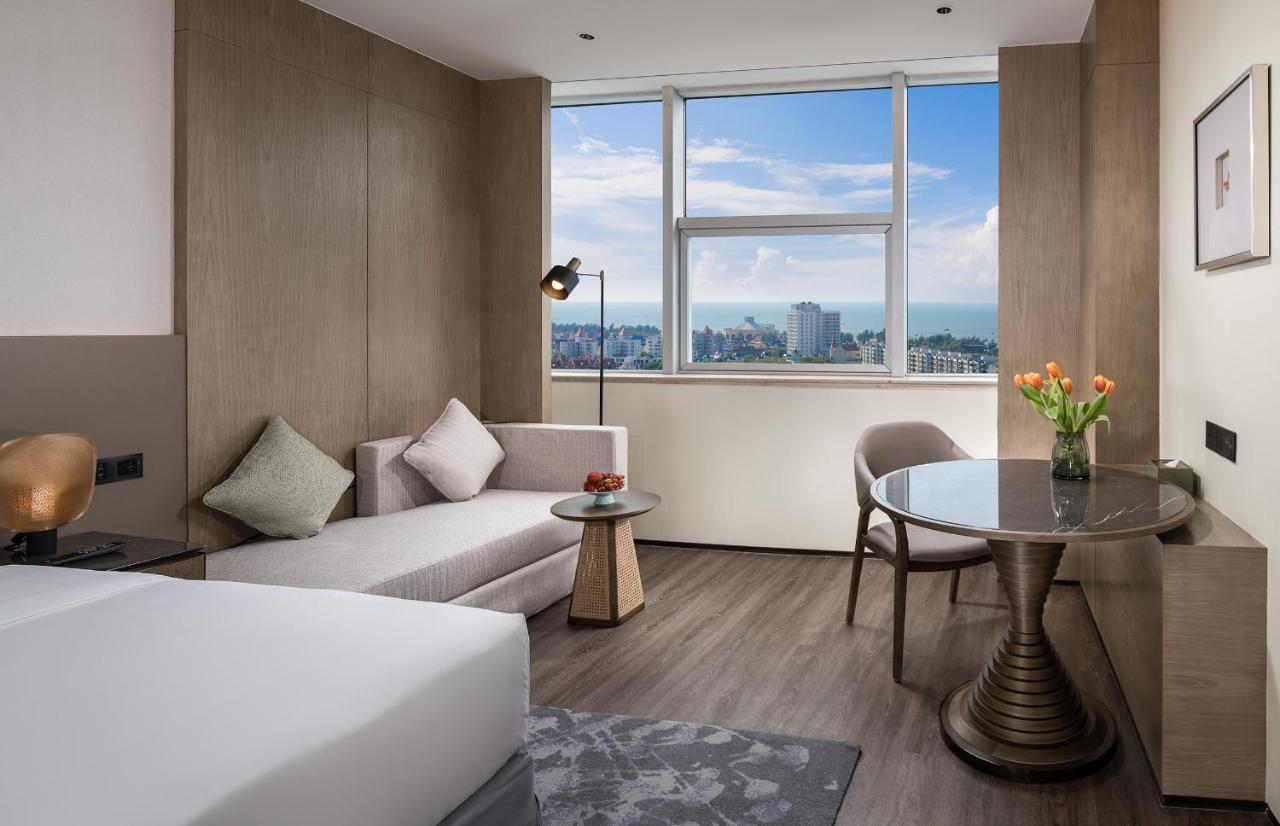 Golden Shining New Century Grand Hotel بيهاي المظهر الخارجي الصورة