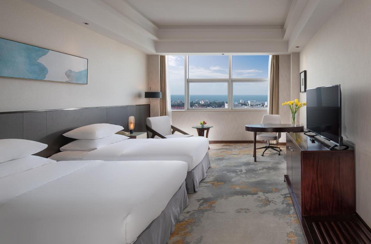 Golden Shining New Century Grand Hotel بيهاي المظهر الخارجي الصورة
