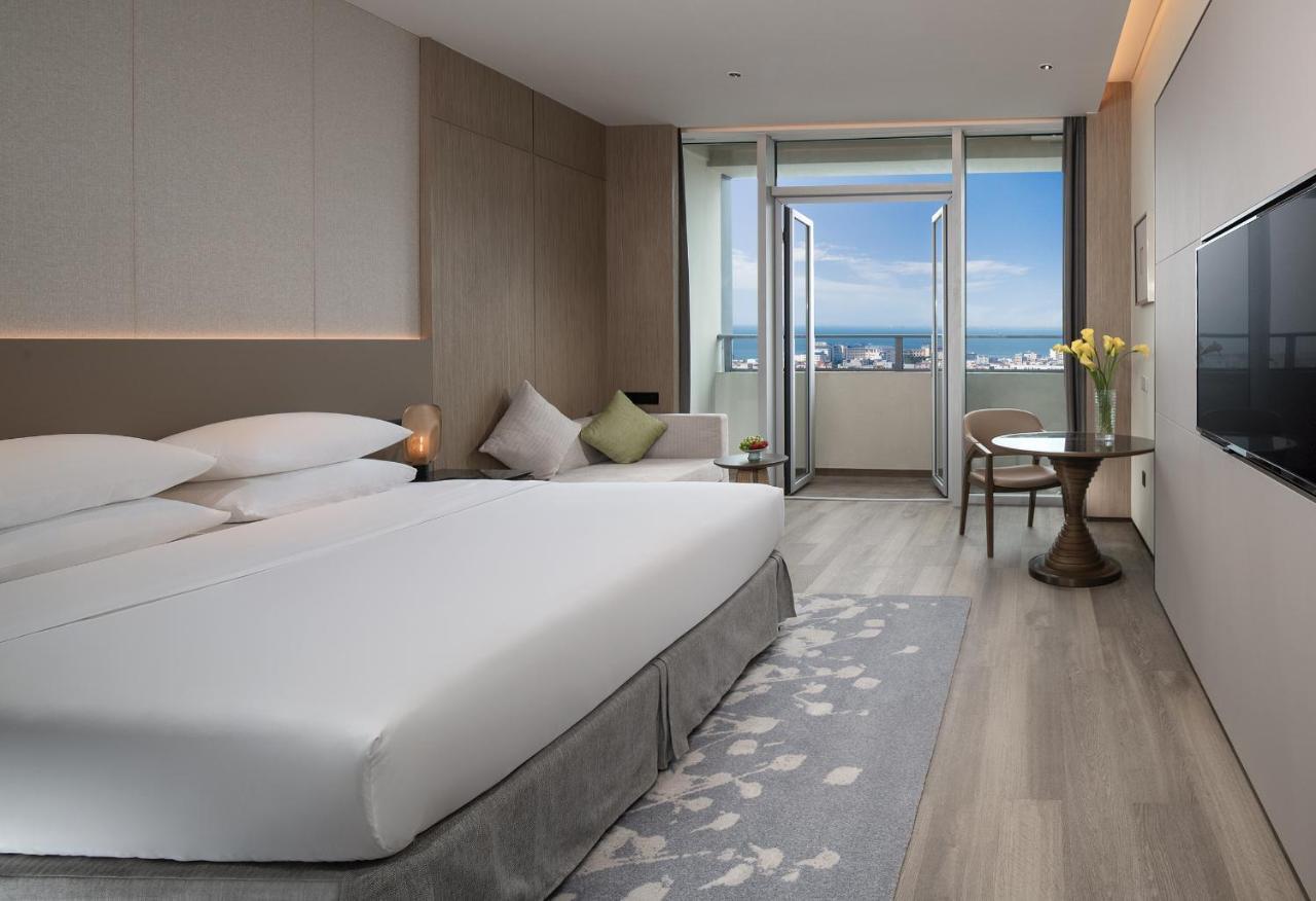 Golden Shining New Century Grand Hotel بيهاي المظهر الخارجي الصورة