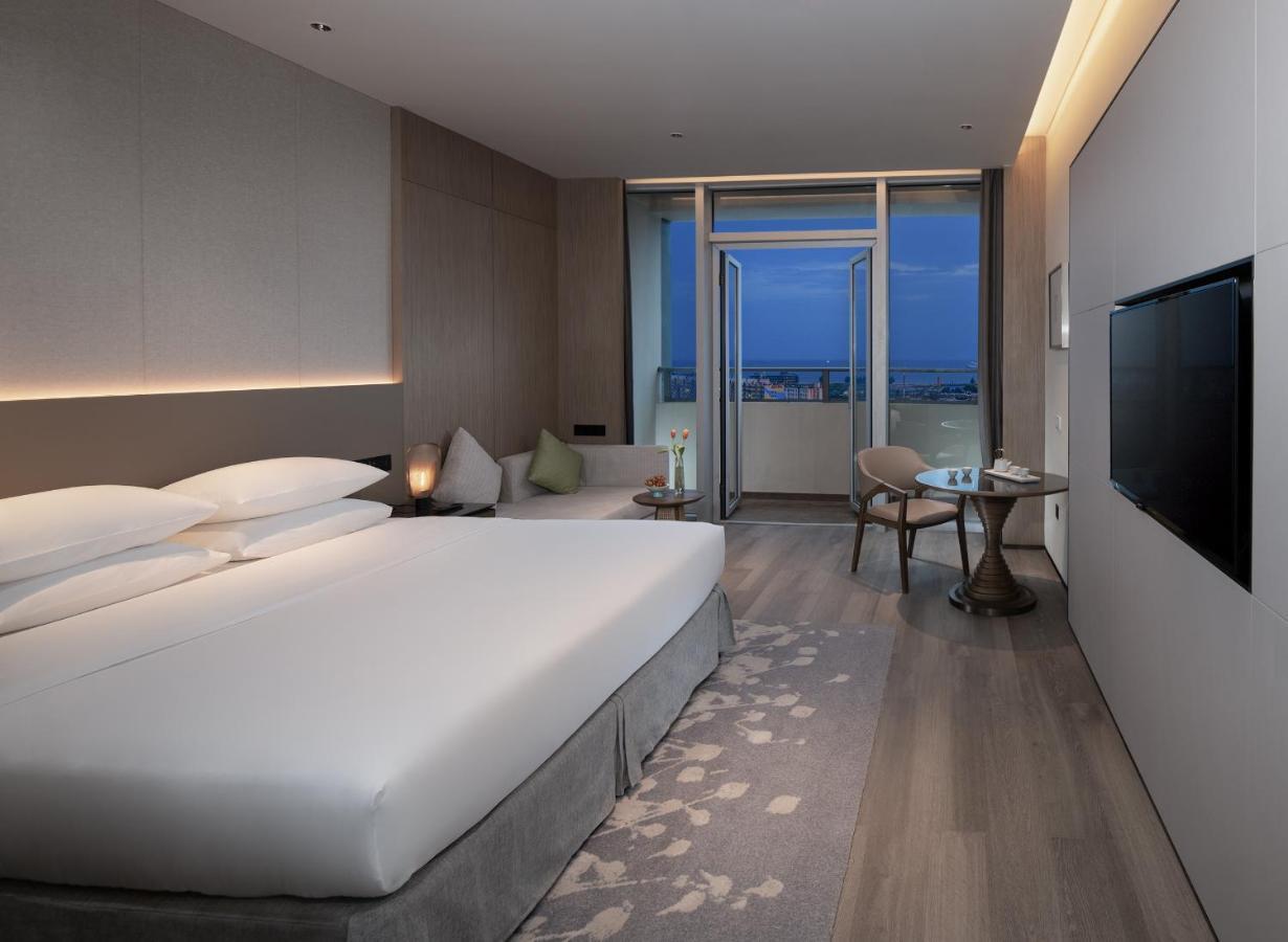 Golden Shining New Century Grand Hotel بيهاي المظهر الخارجي الصورة