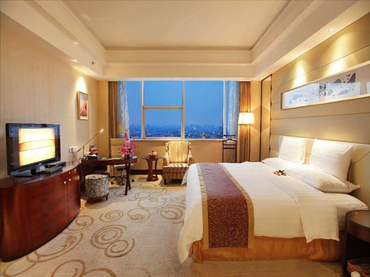 Golden Shining New Century Grand Hotel بيهاي المظهر الخارجي الصورة