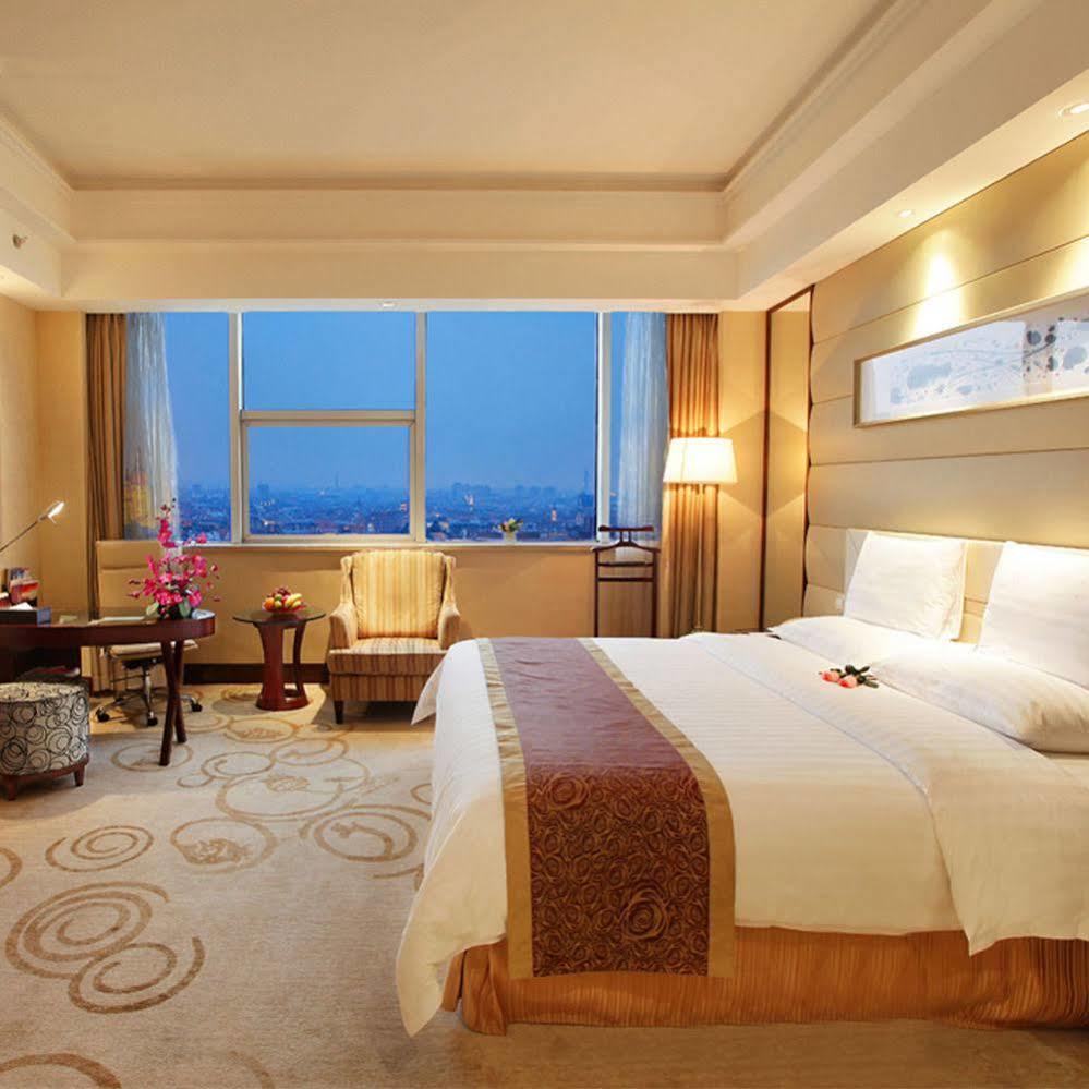 Golden Shining New Century Grand Hotel بيهاي المظهر الخارجي الصورة