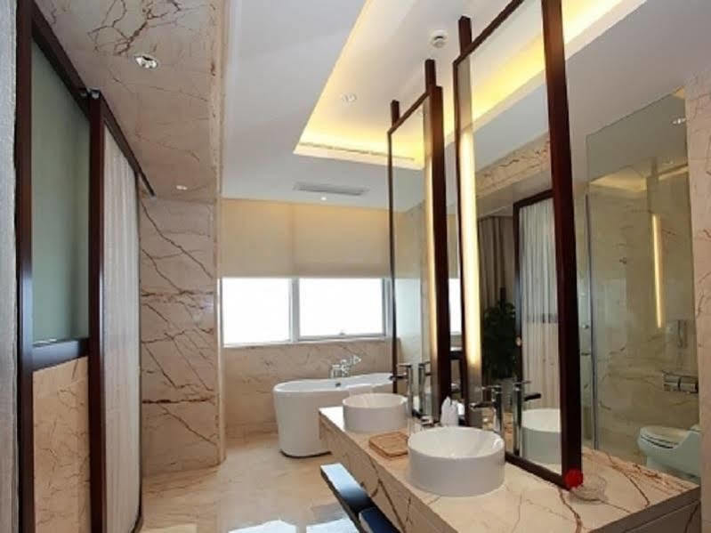 Golden Shining New Century Grand Hotel بيهاي المظهر الخارجي الصورة